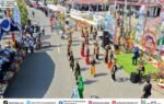Ribuan peserta karnaval budaya berjalan di ruas jalan Puruk Cahu saat Heriyus membuka Karnaval Budaya Murung Raya 2026.